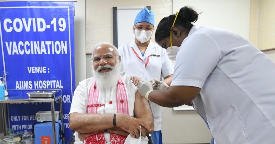 PM Modi taking Covid vaccine shot